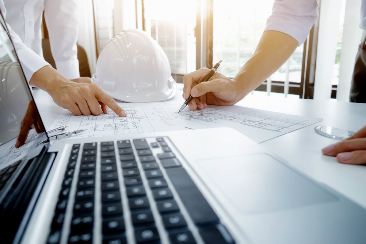 Engineer meeting for architectural project. working with partner Image of engineer meeting for architectural project. working with partner and engineering tools on workplace vintage tone.